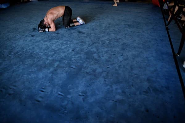 Athlete training on the mat