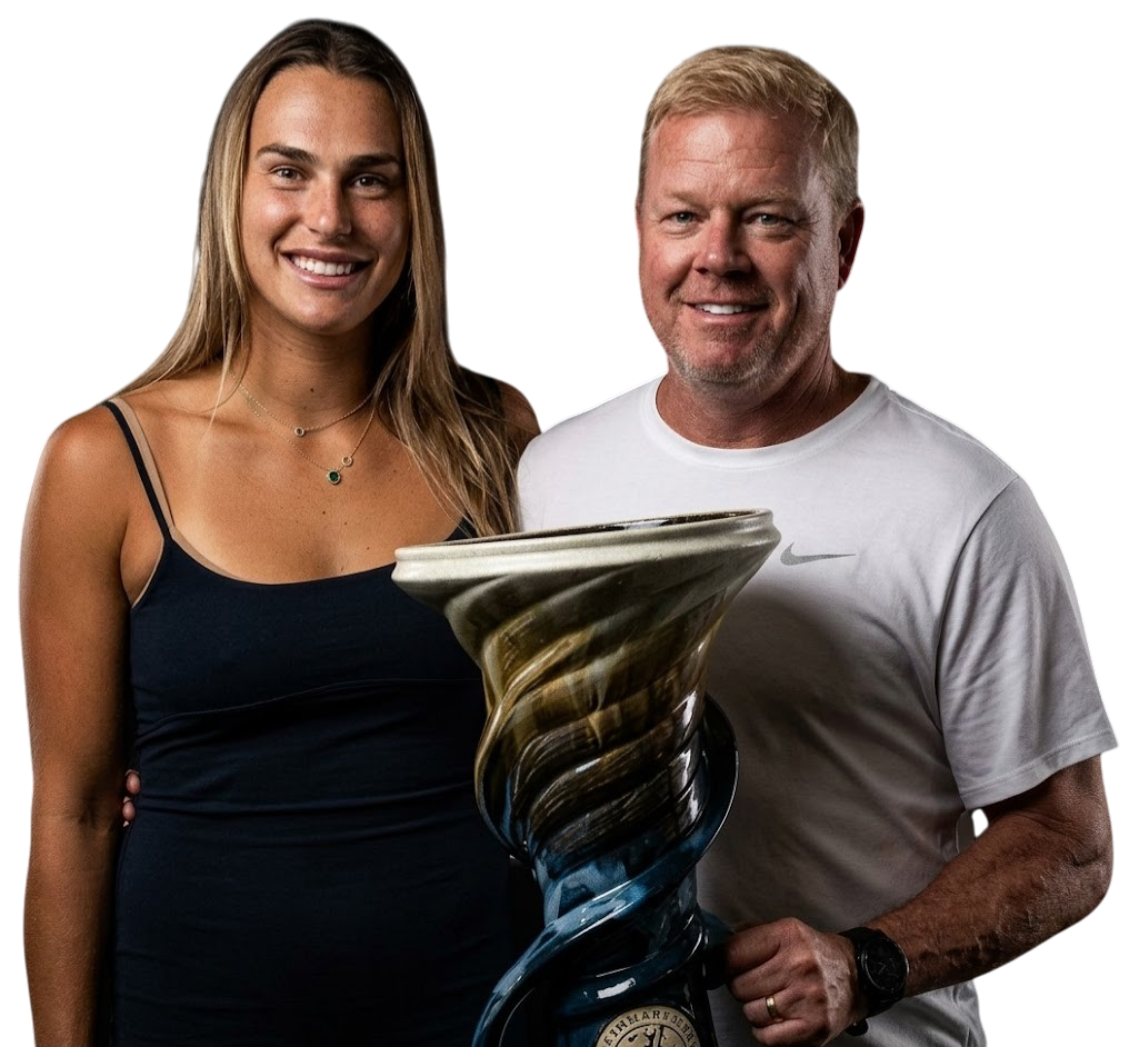 Gavin Macmillan with Aryna Sabalenka holding trophy