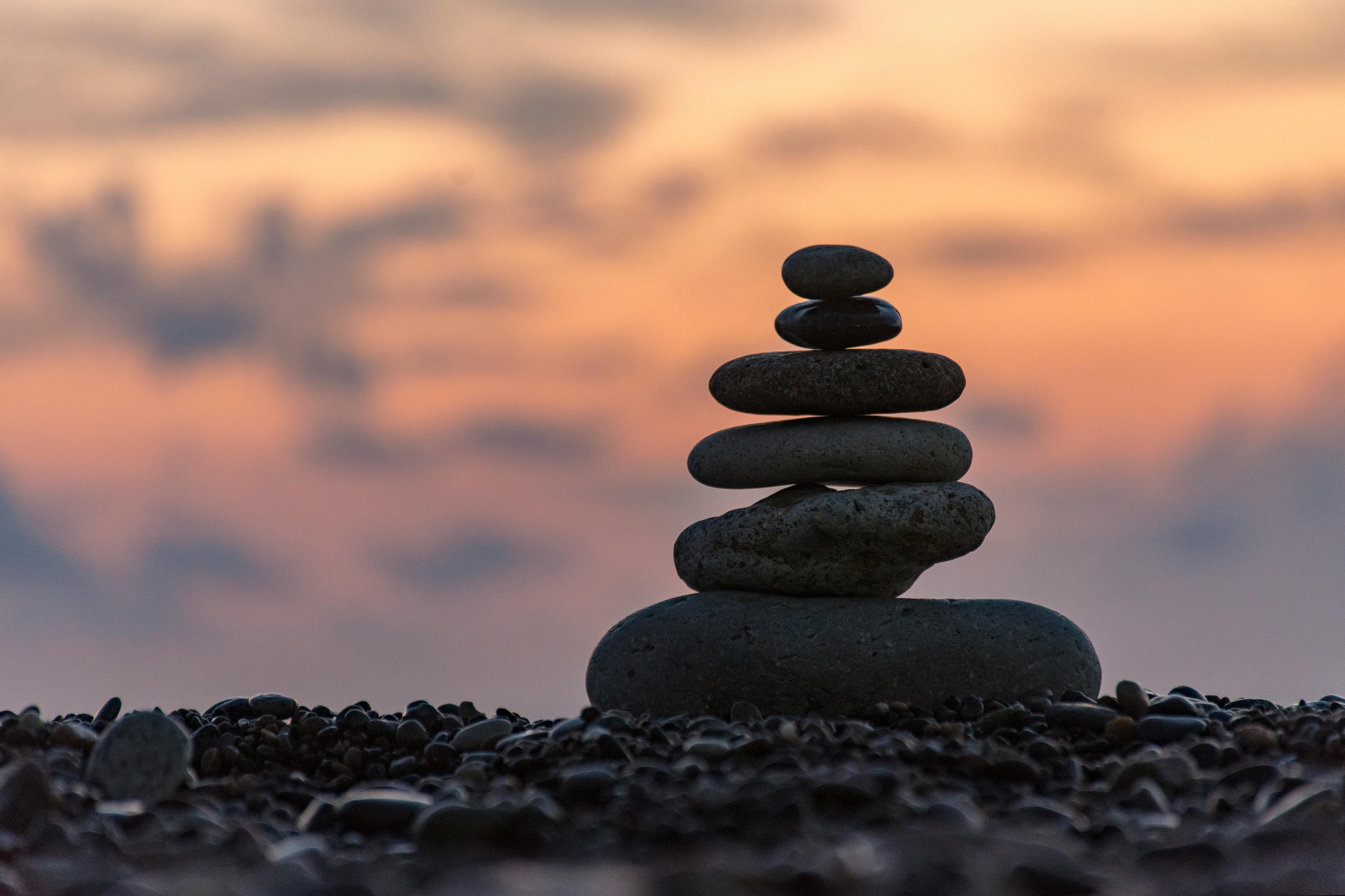 Balanced stones representing geometric precision and biomechanical alignment